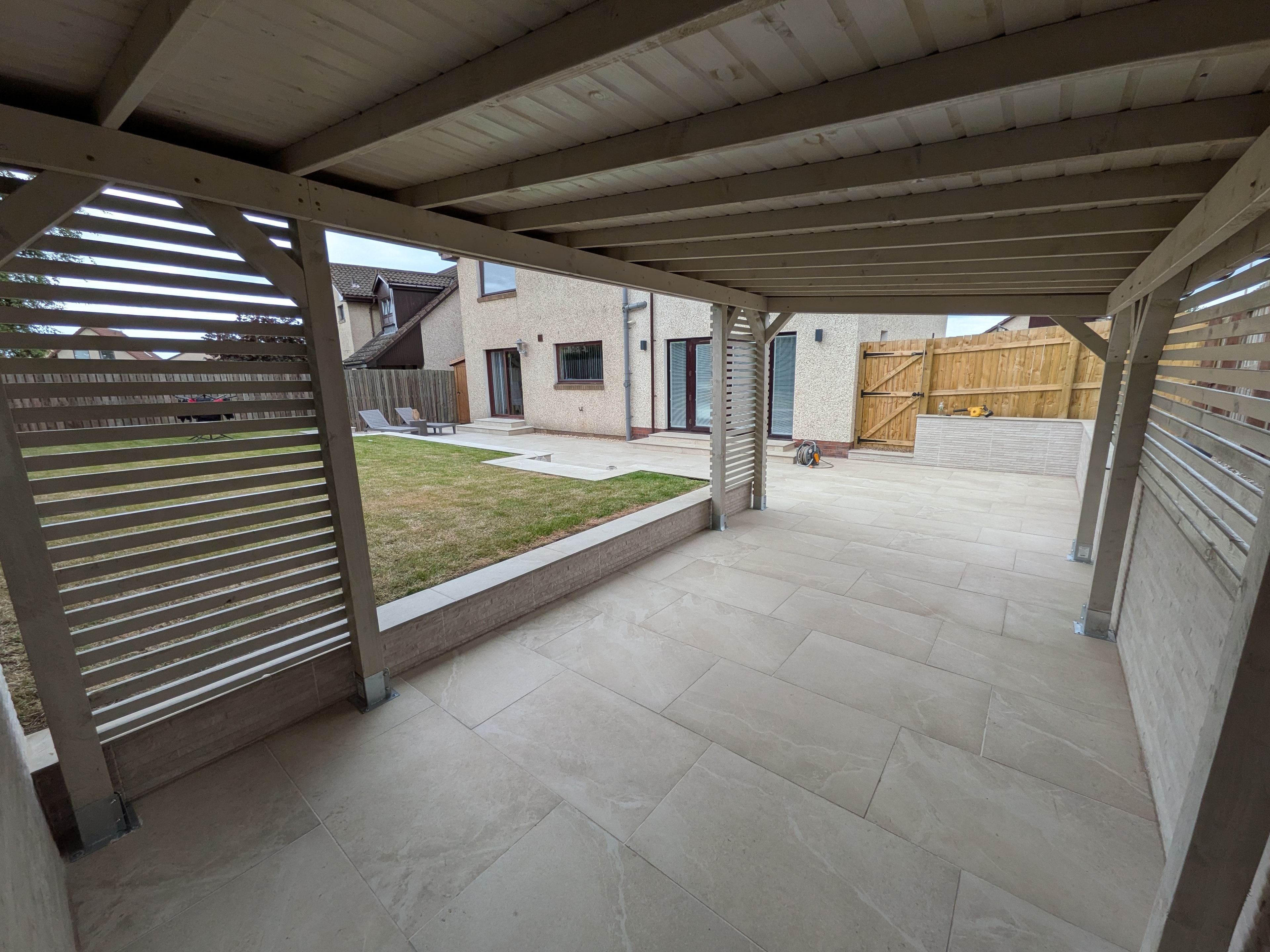 Covered patio summerhouse overlooking garden