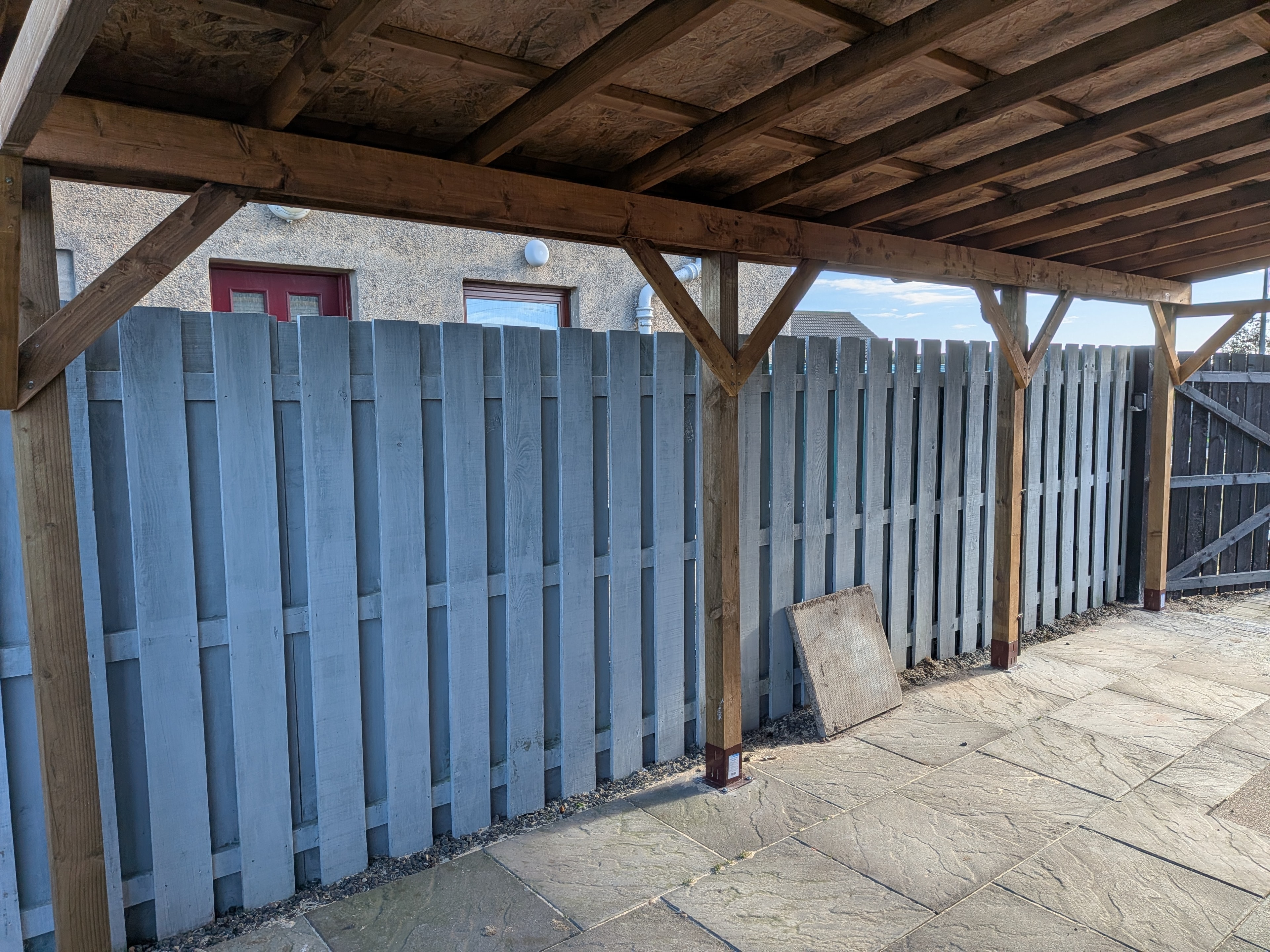 Timber canopy structure with grey fencing